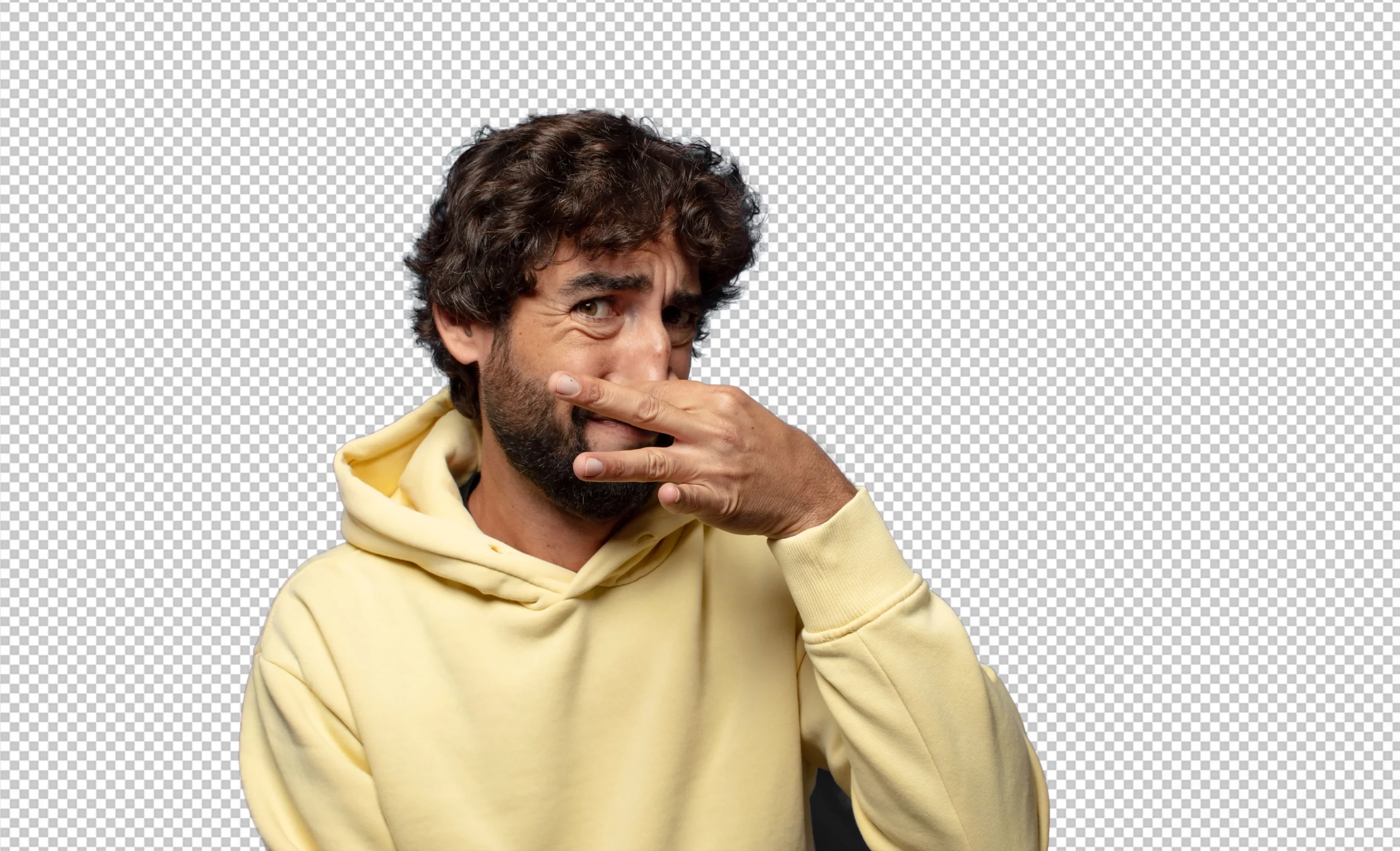 entretenir sneaker blanche Un homme en hoodie jaune qui se pince le nez de dégout.